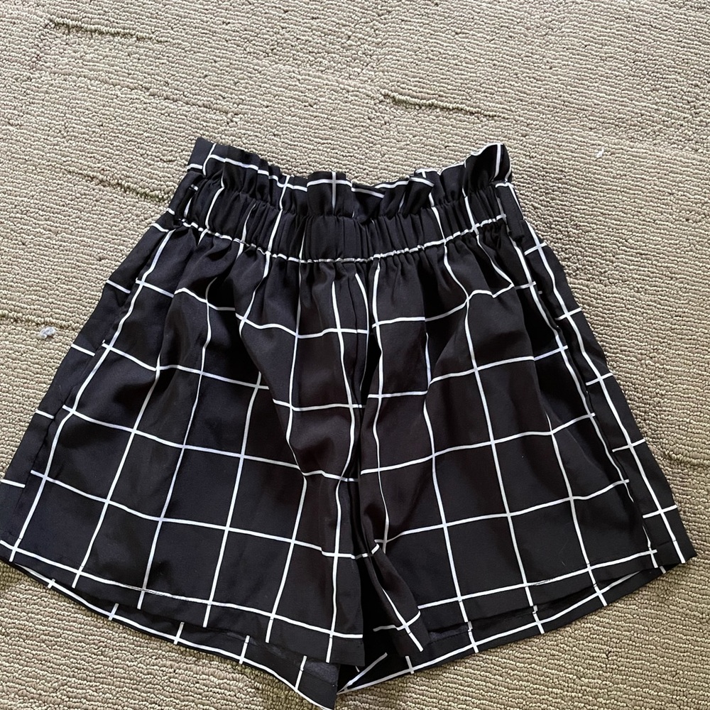 Black striped shorts size 11-12Y